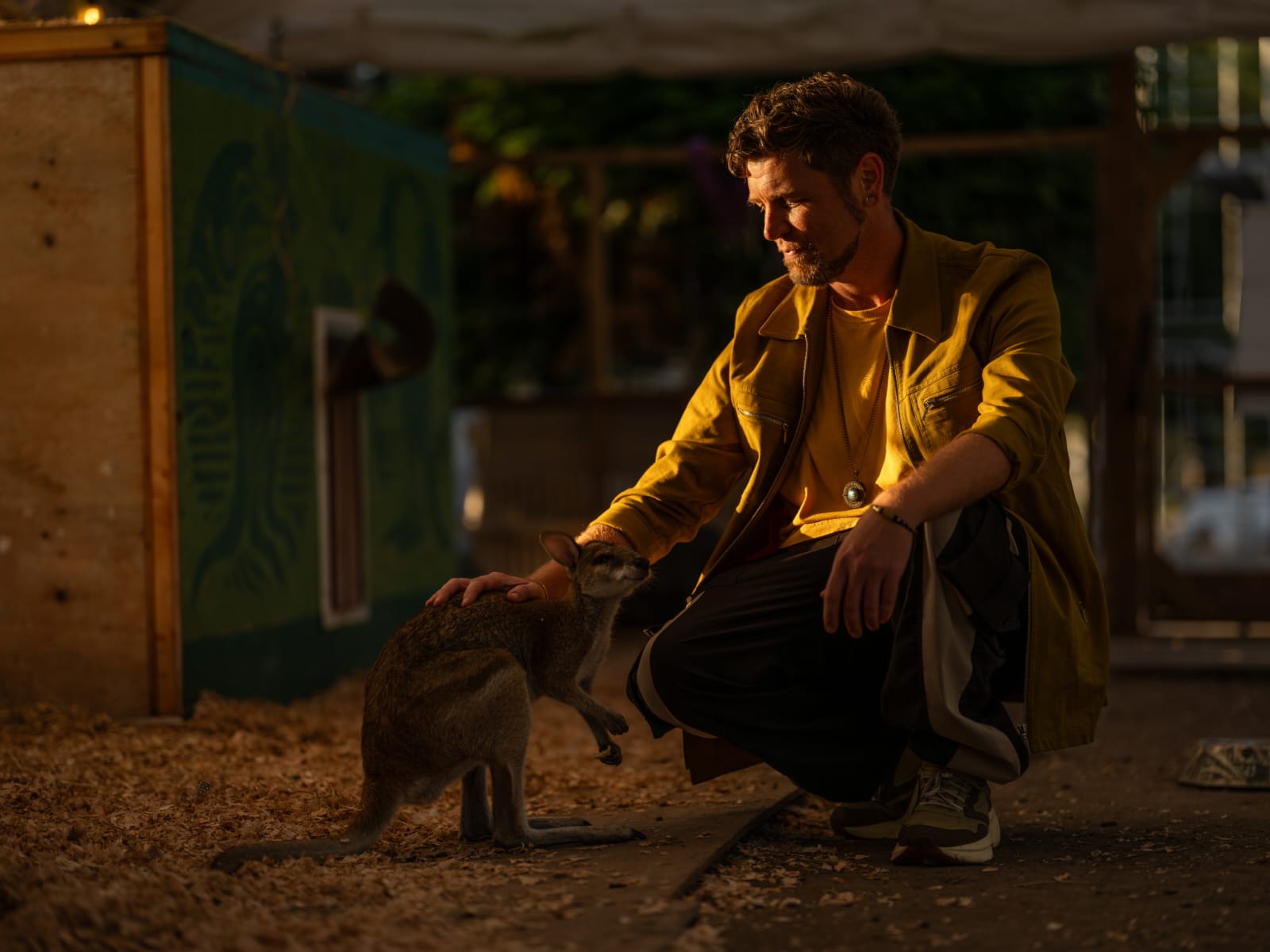 Tala Sage with a kangaroo in golden evening light